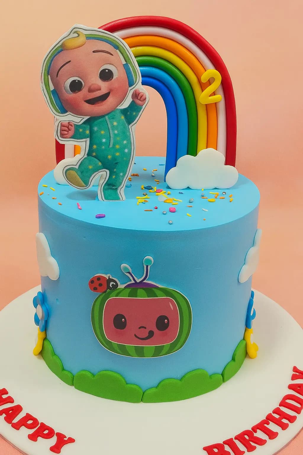 Cocomelon themed birthday cake