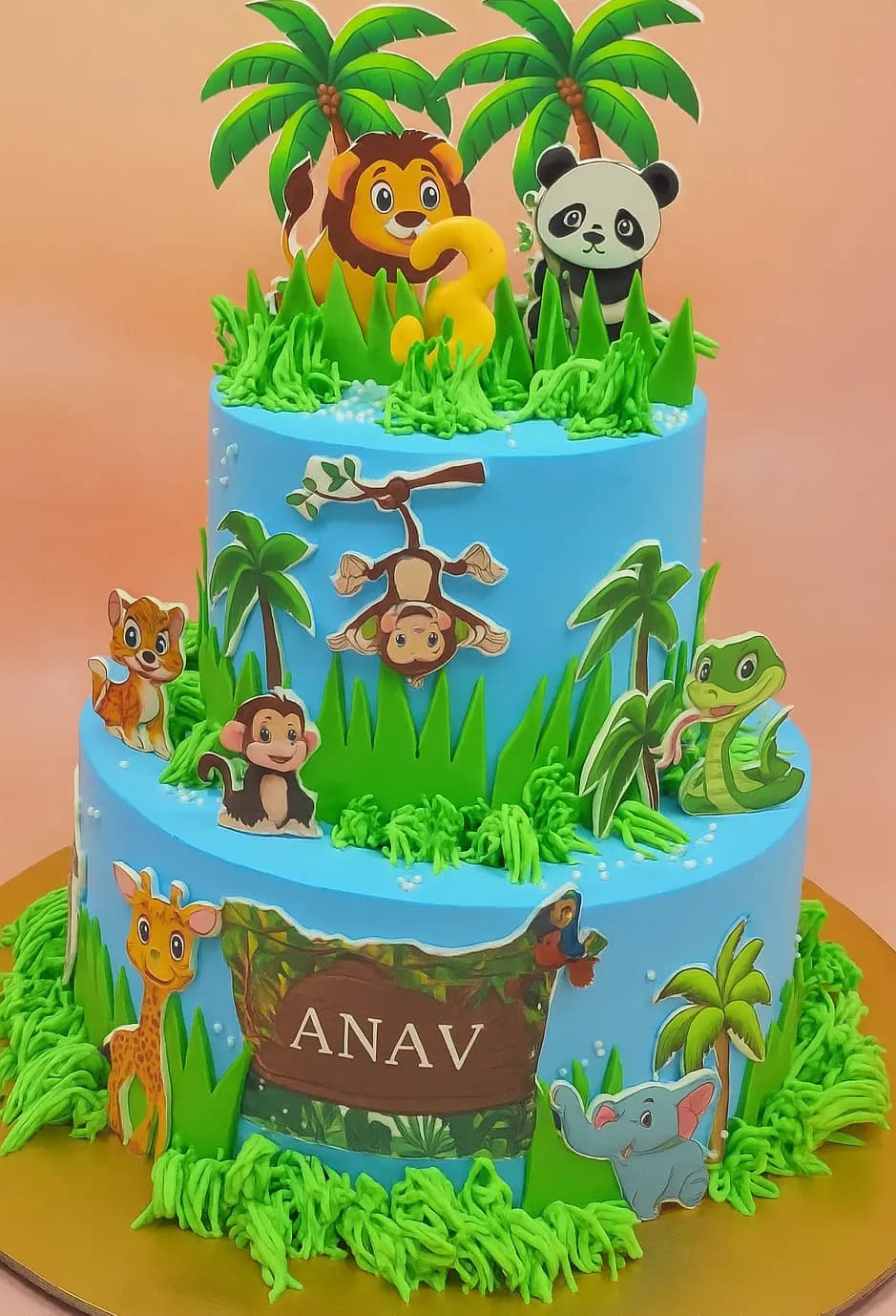 Jungle themed two tier birthday cake