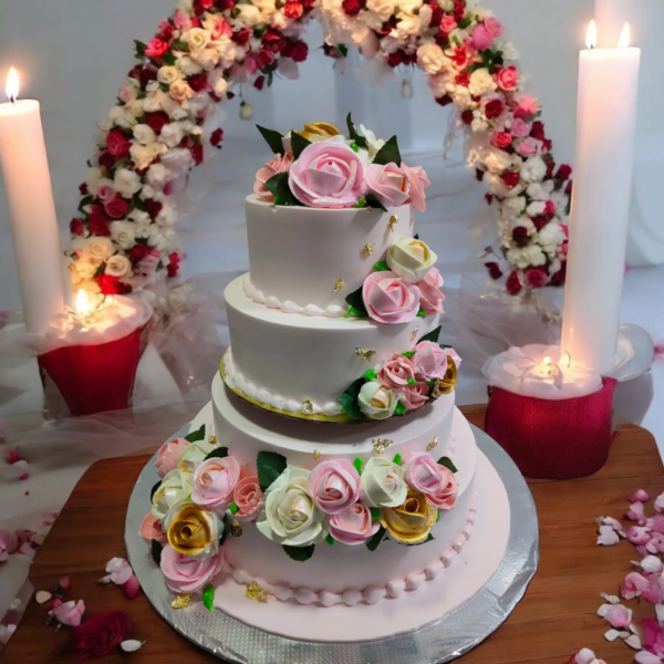 White 3 tier wedding cake with flowers