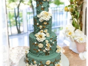 Luruxious 4 Tier Green Wedding Cake with flowers