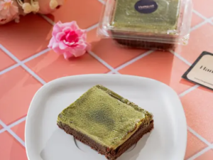 Green tea matcha brownie on white plate