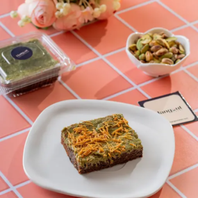 Kunafa Brownie topped with kunafa strands.
