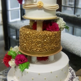 White & gold 3 tier wedding cake